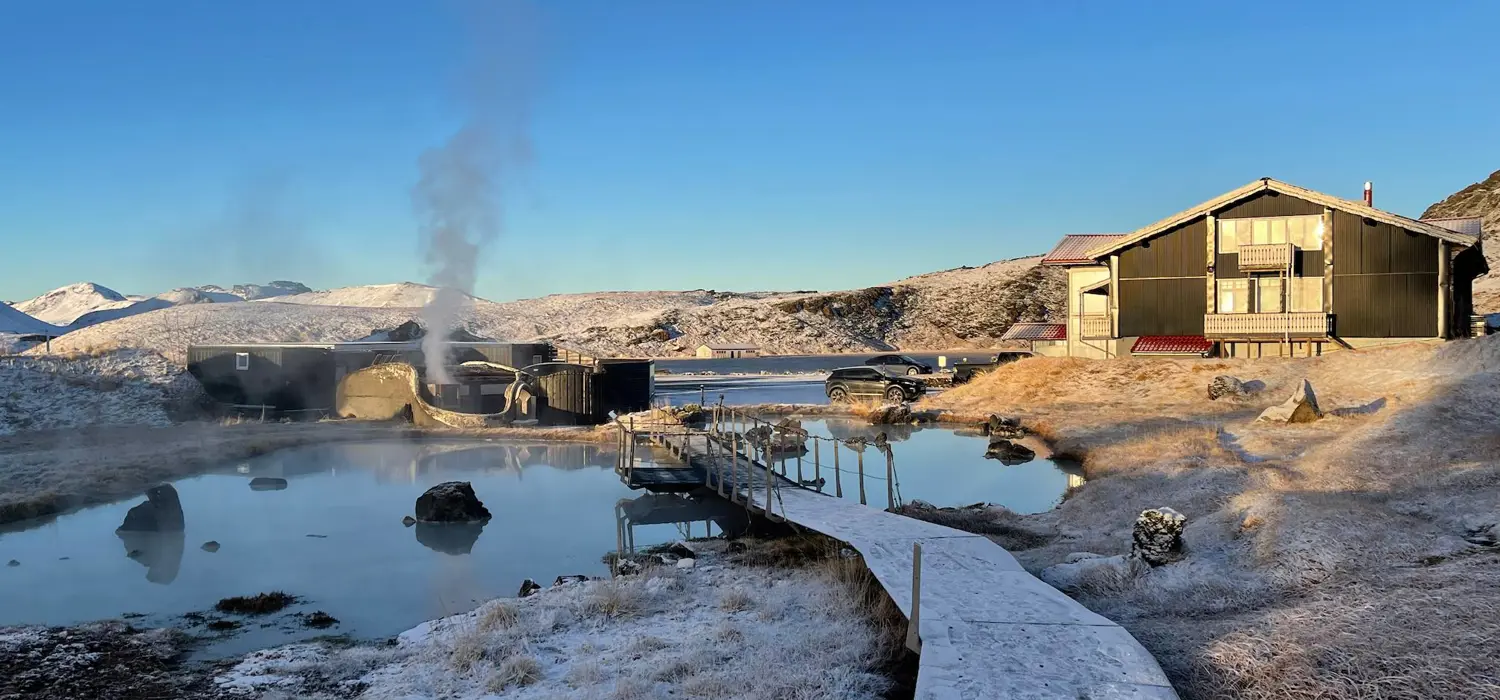 Geothermal pools and walkways beside the Hveradalir lodge