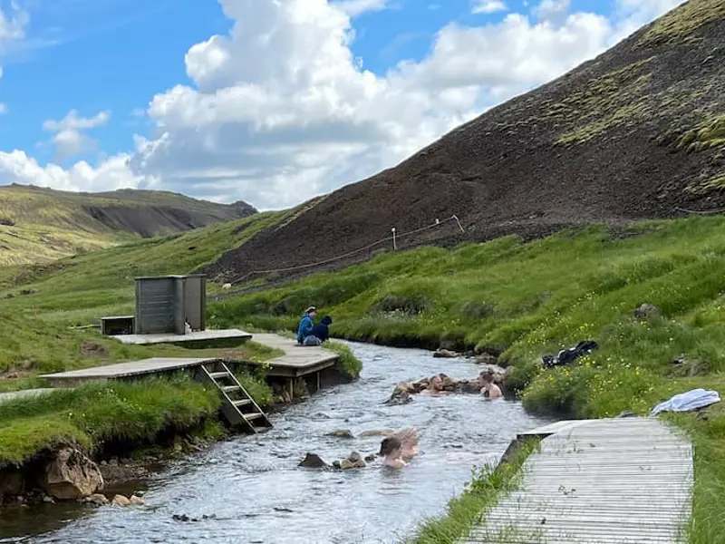 A boardwalk and naturally warm river in Reykjadalur